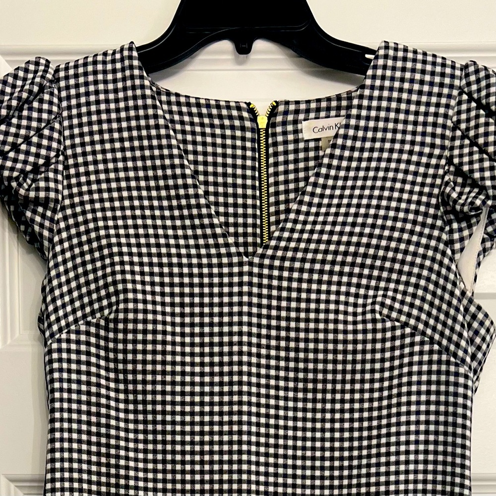 Calvin Klein Black and White Checkered Dress with puffed shoulder sleeves.
